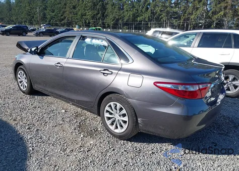 2015 Toyota Camry Le z USA, uszkodzony, nr VIN 4T4BF1FK9FR476241